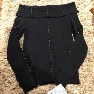 Black sweater with black leather accents